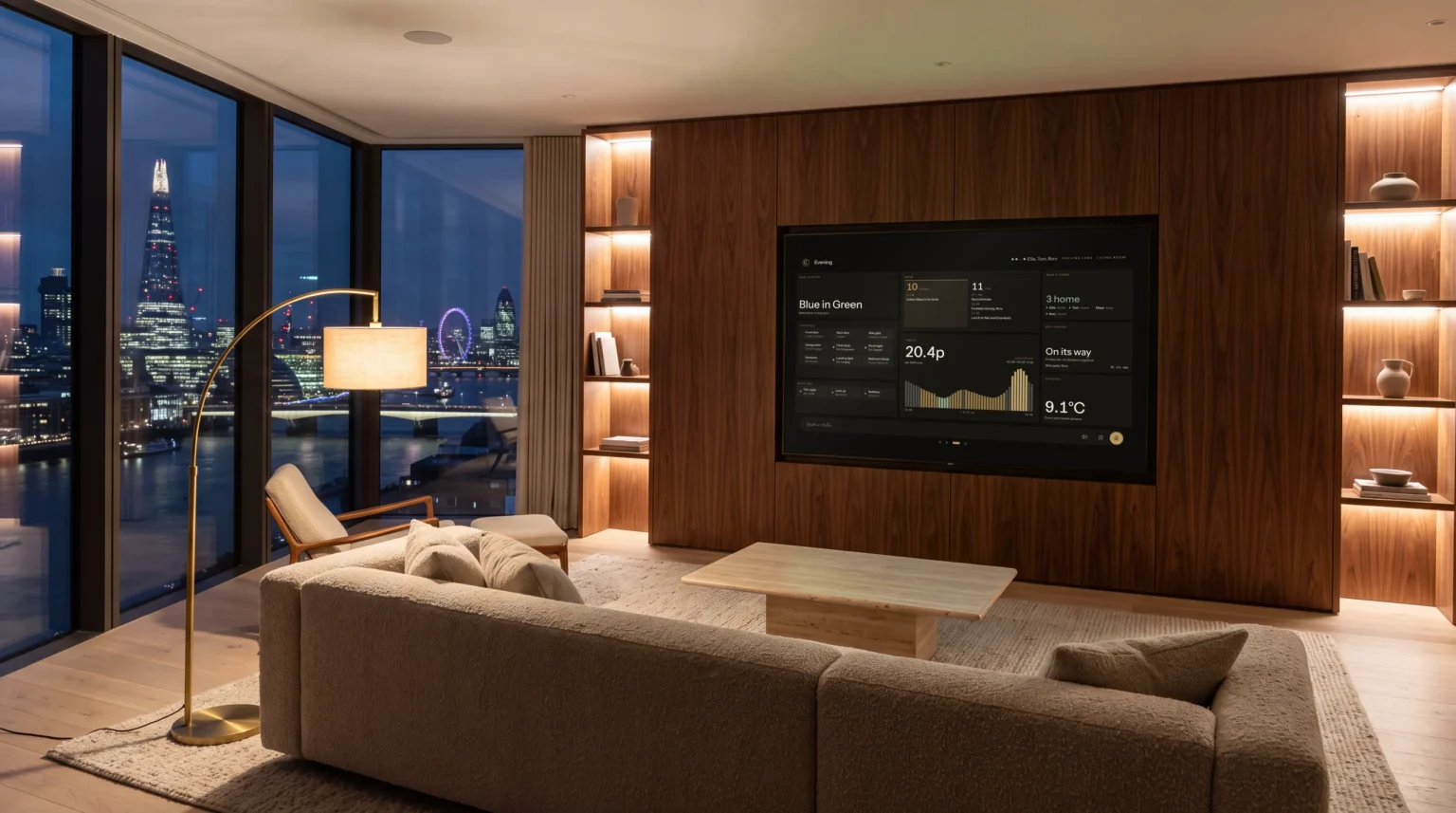 A riverside penthouse living room at night, the television showing the evening view of the house.
